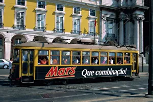 Lisbon Prints: A tram advertising Mars bars in the city of Lisbon