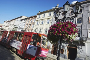 Images Dated 28th July 2009: Tram passing through Market Square (Ploscha Rynok), Lviv (Lvov), Western Ukraine