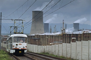 Factories Prints: A tram passing a petrochemical plant near Most, North Bohemia, Czech Republic, Europe