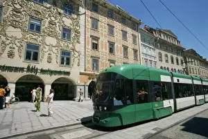 Austrian Eu Prints: Trams run along Herrengasse, stop at Hauptplatz in main street of old town