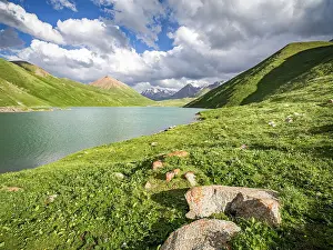 Open Space Prints: Tranquil Kol Ukok Lake surrounded by green mountains under a blue sky