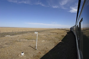 Gobi Prints: Trans-Mongolian train travelling through the Gobi desert
