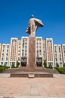 Parliament Building Prints: Transnistria Parliament building in Tiraspol with a statue of Vladimir Lenin in front