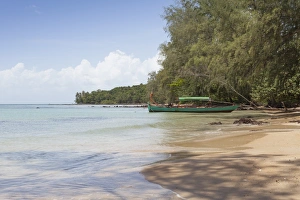 Bamboo Island Prints: Travel boat moored on Bamboo Island
