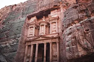 Treasury Prints: Treasury (Al Khazneh) monument carved into the stone on the side of a mountain