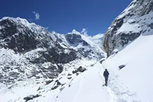 Senior Man Prints: Trekker walking over Cho La Pass with Lobuche West and East on left side