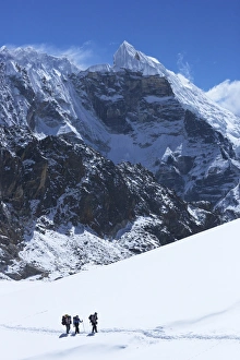 Solukhumbu District Prints: Trekkers crossing glacier on Cho La Pass