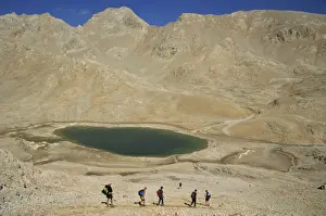 Arid Landscape Prints: Trekking past lake on Yedigoller Plateau (Seven Lakes)