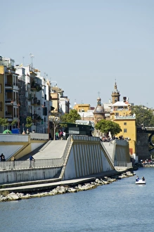 Triana district on left and the river Rio Guadalquivir