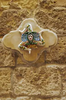 Brick Wall Prints: Trinacria three-legged female shaped emblematic symbol of Sicily, Italy, Europe