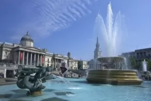 Trafalgar Square Collection: Tritons and dolphin fountain with the Olympic digital countdown clock and the National Gallery