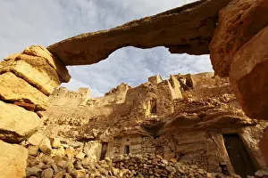 Cave Dwellings Prints: Troglodyte cave dwellings, hillside Berber village of Chenini, Tunisia