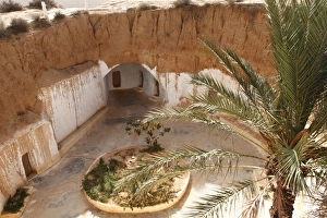 Troglodyte Prints: Troglodyte pit home, Berber underground dwellings, Matmata, Tunisia, North Africa, Africa