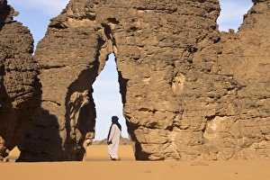 Tuareg Prints: A Tuareg walking on the erg of Uan Kaza in the Fezzan desert, Libya, North Africa, Africa
