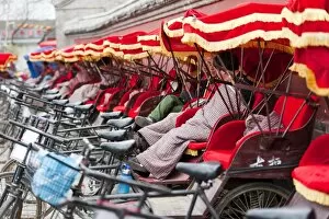 Images Dated 26th April 2010: Tuk-tuk (Tricycles) drivers, Gulou Area, Dongcheng District, Beijing, China, Asia