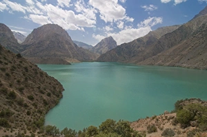 Turquoise Alexander Lake (Iskanderkul Lake) in Fann Mountains, Tajikistan Turquoise Alexander Lake (Iskanderkul Lake) in Fann Mountains, Tajikistan