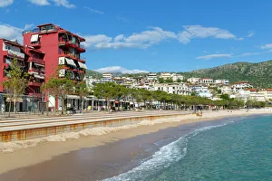 Albania Prints: Turquoise blue sea at town beach of Himare, Albanian Riviera, Albania, Europe