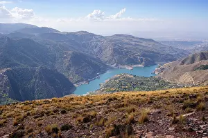 Ridges Prints: Turquoise mountain lake below steep ridges in Guejar Sierra located in Sierra Nevada