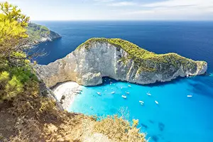 Shipwreck Prints: Turquoise sea washing the white sand of Navagio Beach (Shipwreck Beach) view from clifftop