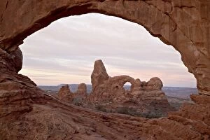 Turret Arch through North Window at dawn, Arches National Park, Utah, United s tates of America