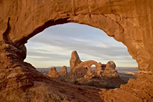 Turret Arch through North Window at dawn, Arches National Park, Utah, United States of America