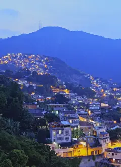 Favela Prints: Twilight view of the favelas Unidos de Santa Teresa Morro do Escondidinho and Morro dos Prazeres