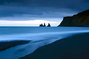 Blue Colour Prints: Twilight view towards rock stacks at Reynisdrangar off the coast at Vik