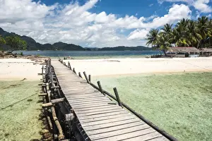 Arms Outstretched Prints: Twin Beach, a tropical, white sandy beach near Padang in West Sumatra, Indonesia