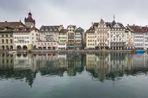 Lucerne Prints: The typical buildings of the old medieval town are reflected in River Reuss, Lucerne