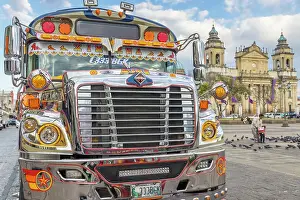 Kids Prints: A typical chicken bus standing at the main square of Guatemala City with view to