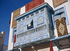 Carpet Prints: Typical decorative window in a carpet shop in the medina