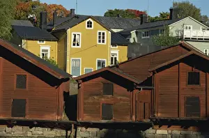 Porvoo Prints: Typical heavy red of fishermens cottages and sheds lining the River Porvoo