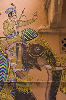 Elephant Prints: Typical house decorated with Mewar folk art of man riding elephant