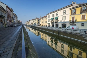 Milan Prints: Typical houses reflected in the water of Naviglio Grande, Milan, Lombardy, Italy, Europe