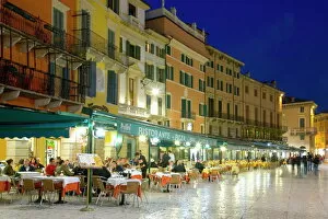 Typical restaurants overlooking Piazza Bra after dark, Verona, Veneto, Italy, Europe