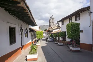 Traditionally Mexican Prints: Typical street, in the distance the Parroquia de San Francisco de Assisi, Valle de Bravo