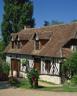 Calvados Prints: Typical timbered cottage in summer near St