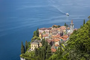 Lake Como Prints: The typical village of Varenna surrounded by the blue water of Lake Como and gardens