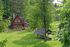 Cabin Prints: Typical wooden house on the edge of Ukojas lake