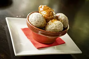 Potato Prints: Typical wrinkled potatoes with spicy sauce in a bowl (Papas Arrugadas con Mojo Picon)