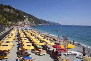 Umbrellas on the New Town Beach at Monterosso al Mare, Cinque Terre, UNESCO World Heritage Site, Liguria, Italy, Mediterranean, Europe