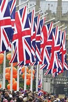 Images Dated 29th April 2011: Union flags and spectators outside Houses of Parliament, during the marriage of Prince William to