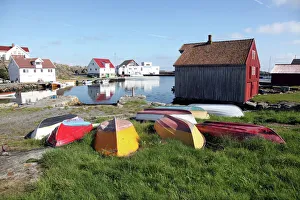 Settlement Prints: Upturned boats, South Harbour, Utsire island, west of Karmoy, Norway, Scandinavia, Europe