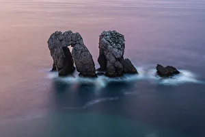 Natural Arch Prints: Urro del Manzano, sea stacks in Costa Quebrada at dusk, Cantabria, Spain, Europe