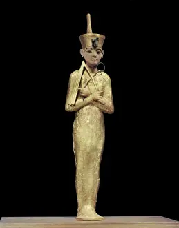 Ushabti of Tutankhamun, showning king wearing the red crown of the North