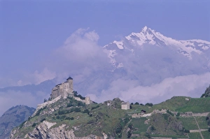 Valeria castle with mountains beyond