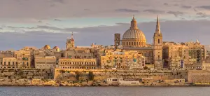 Malta Prints: Valletta skyline panorama at sunset with the Carmelite Church dome and St