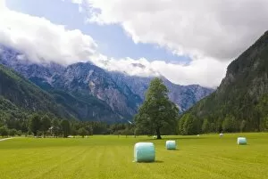 Valley with meadows and hay bales , Logars ka Dolina, s lovenia, Europe