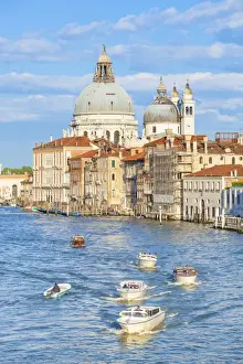 Grand Canal Prints: Vaporettos (water taxis) passing the grand church of Santa Maria della Salute