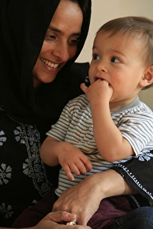 Images Dated 27th March 2007: Veiled Muslim woman and child, France, Europe